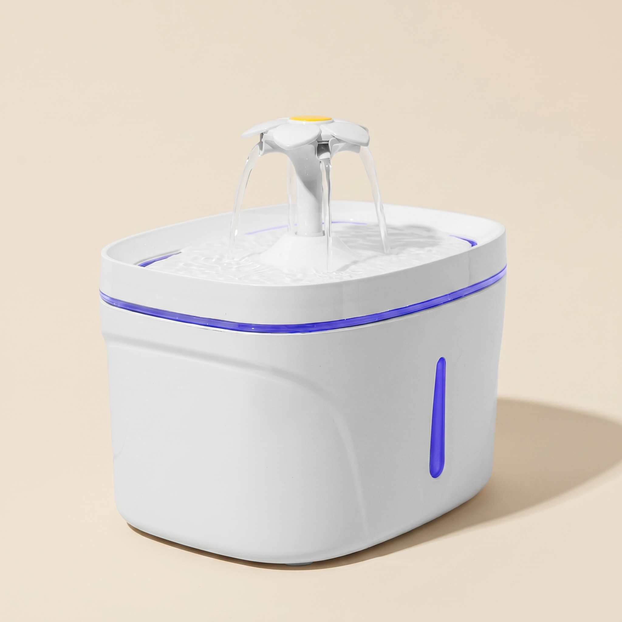 Arroyo filtered pet water fountain on a clean sand studio background